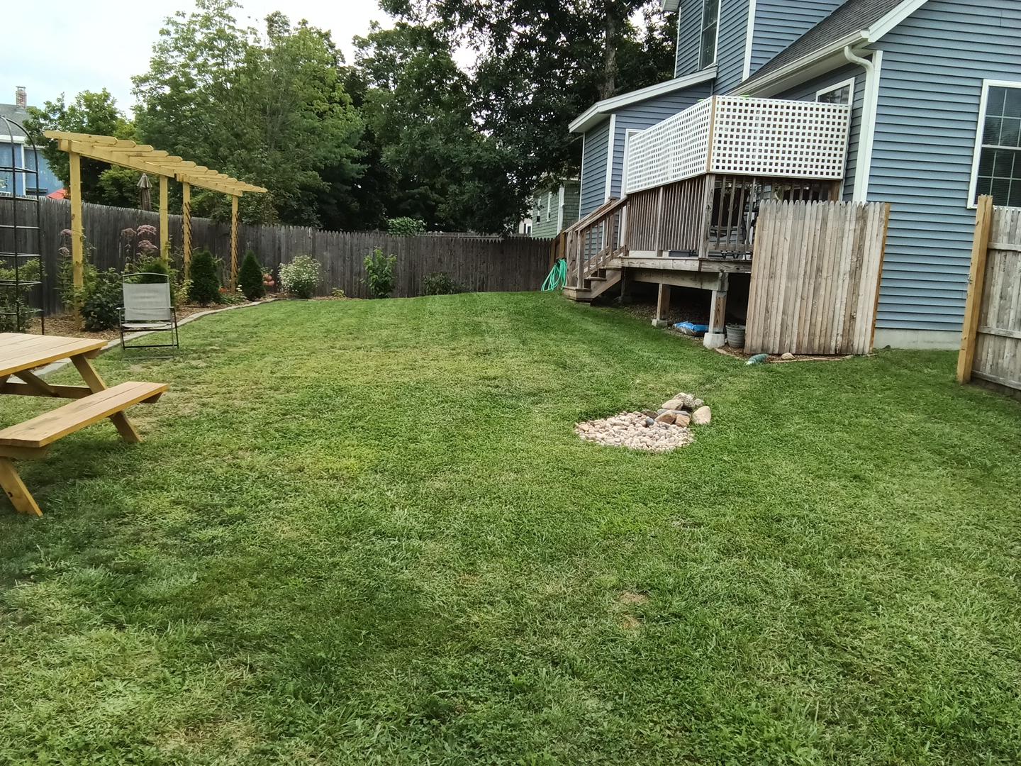Wider backyard view before the picnic-table gravel pad was installed in Jaffrey, NH.