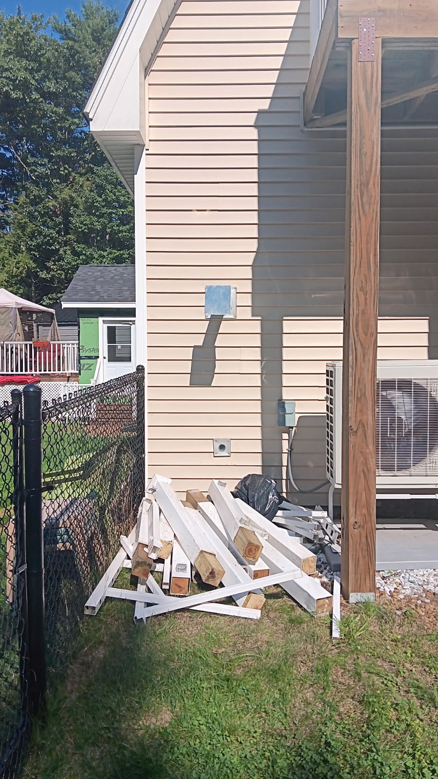 Exterior stove venting before the missing intake cover was fitted in Bennington, NH.